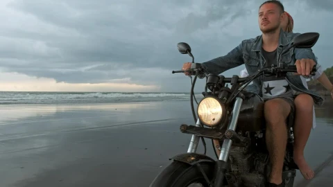 Stock Video Man With His Girlfriend Riding Motorcycle On Beac Animated Wallpaper - Free Live Wallpaper