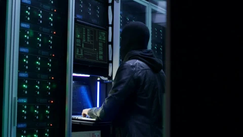Stock Video Man With Face Mask Hacking A Data Cente Animated Wallpaper - Free Live Wallpaper