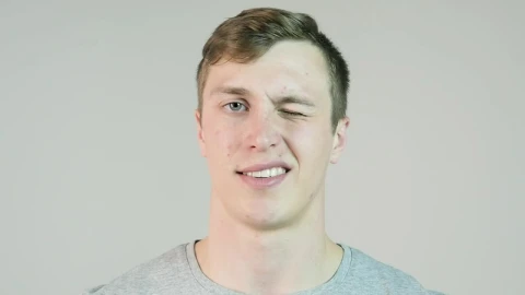 Stock Video Man Winking Against An Isolated Backgroun Animated Wallpaper - Free Live Wallpaper