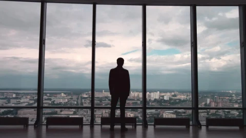 Stock Video Man Wearing A Suit Looking Out Towards A Cit Animated Wallpaper - Free Live Wallpaper