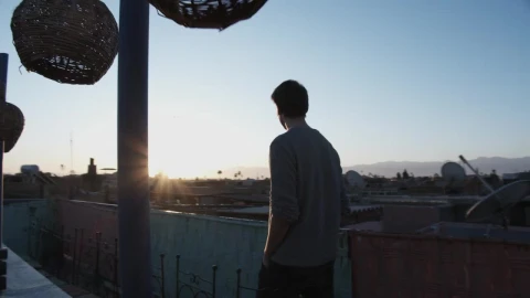Stock Video Man Walks On The Rooftop With Sunrise Vie Animated Wallpaper - Free Live Wallpaper