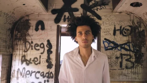 Stock Video Man Walking Through A Graffitied Hal Animated Wallpaper - Free Live Wallpaper