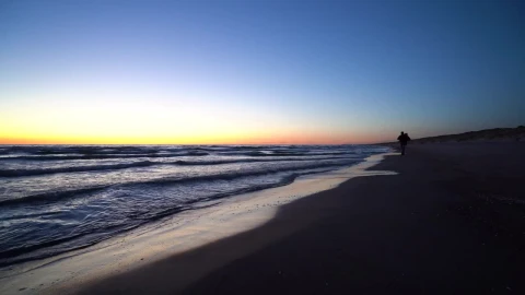 Stock Video Man Walking On The Beach With A Backpac Animated Wallpaper - Free Live Wallpaper