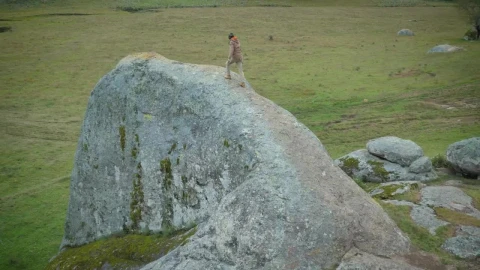Stock Video Man Walking On A Giant Ston Animated Wallpaper - Free Live Wallpaper