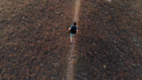Stock Video Man Walking Down A Hill In An Aerial Sho Animated Wallpaper - Free Live Wallpaper