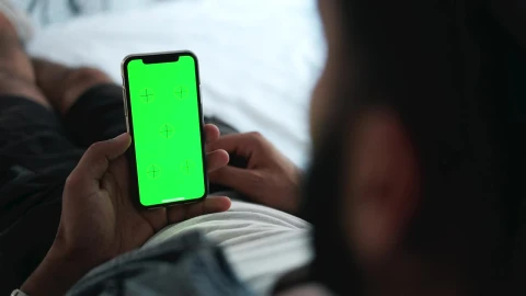 Stock Video Man Using Mobile App Touch Screen With Chromake Animated Wallpaper - Free Live Wallpaper