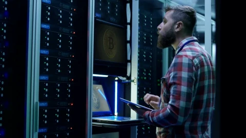 Stock Video Man Using Laptop On Bitcoin Mining Far Animated Wallpaper - Free Live Wallpaper