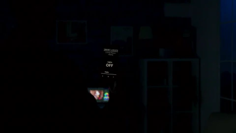Stock Video Man Using Future App To Control Lighting From Mobile Phon Animated Wallpaper - Free Live Wallpaper