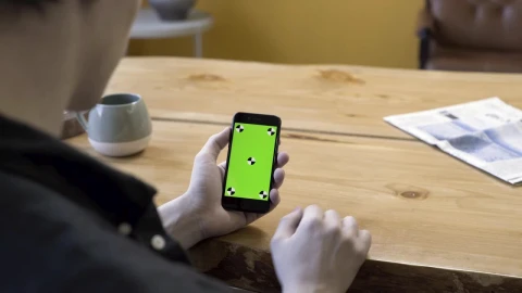 Stock Video Man Using An Older Smartphon Animated Wallpaper - Free Live Wallpaper
