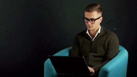 Stock Video Man Typing On Laptop With Black Backgroun Animated Wallpaper - Free Live Wallpaper