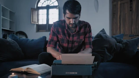 Stock Video Man Typing On A Typewriter Sitting In A Roo Animated Wallpaper - Free Live Wallpaper