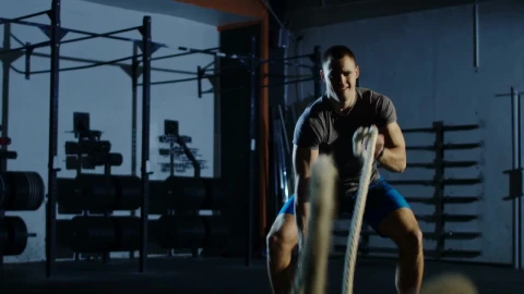 Stock Video Man Training With Ropes In The Gy Animated Wallpaper - Free Live Wallpaper