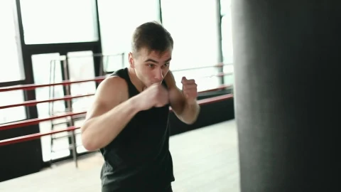 Stock Video Man Training On Punching Bag In Boxing Rin Animated Wallpaper - Free Live Wallpaper