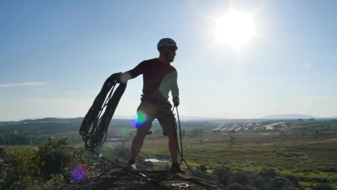 Stock Video Man Throwing A Rope From The Top Of A Hil Animated Wallpaper - Free Live Wallpaper
