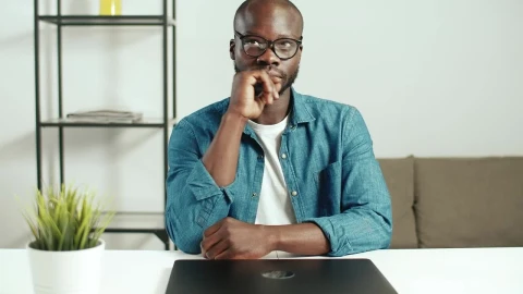 Stock Video Man Thinks What To Do Before Starting Wor Animated Wallpaper - Free Live Wallpaper