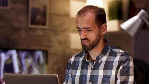 Stock Video Man Thinks Hard While Working On Laptop From Hom Animated Wallpaper - Free Live Wallpaper