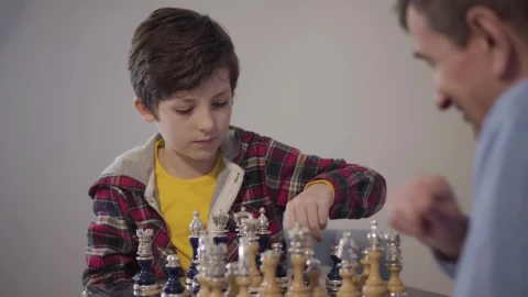 Stock Video Man Teaches Young Boy How To Win At Ches Animated Wallpaper - Free Live Wallpaper