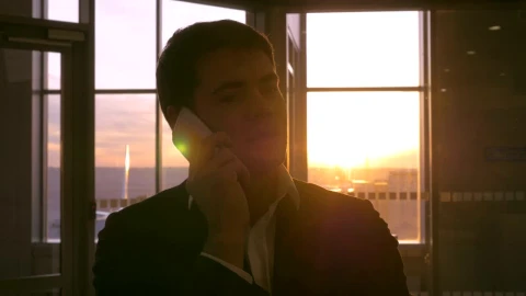 Stock Video Man Talking On The Phone Before Boarding A Fligh Animated Wallpaper - Free Live Wallpaper