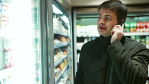 Stock Video Man Talking On His Phone At The Shop Animated Wallpaper - Free Live Wallpaper