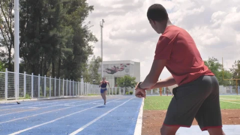 Stock Video Man Taking Time To A Girl Runnin Animated Wallpaper - Free Live Wallpaper