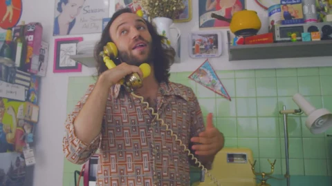 Stock Video Man Talking Cheerfully On An Old Telephon Animated Wallpaper - Free Live Wallpaper