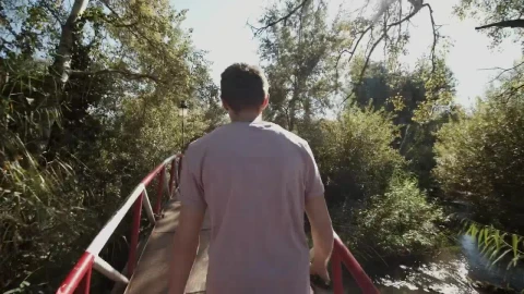 Stock Video Man Taking A Walk Through A Park In Morocc Animated Wallpaper - Free Live Wallpaper
