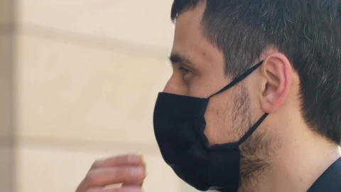 Stock Video Man Takes Off His Mask And Breathes Fresh Ai Animated Wallpaper - Free Live Wallpaper