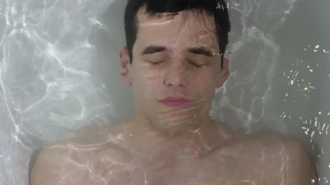Stock Video Man Submerged In A Bathtub Top Sho Animated Wallpaper - Free Live Wallpaper