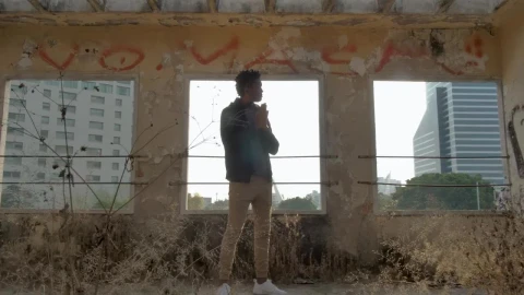 Stock Video Man Standing Outside Abandoned Buildin Animated Wallpaper - Free Live Wallpaper