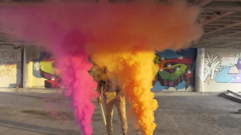 Stock Video Man Standing Between Colorful Smoke Bomb Animated Wallpaper - Free Live Wallpaper