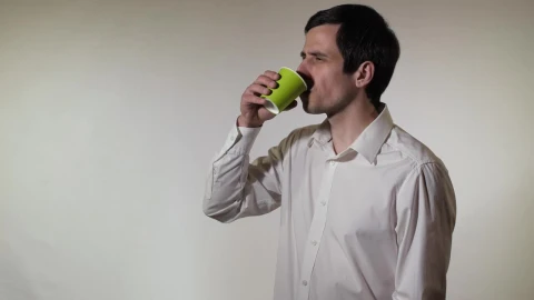 Stock Video Man Spills His Drink While Drinking I Animated Wallpaper - Free Live Wallpaper