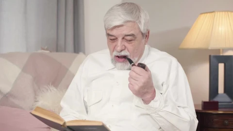 Stock Video Man Spends An Evening Smoking Pipe And Readin Animated Wallpaper - Free Live Wallpaper