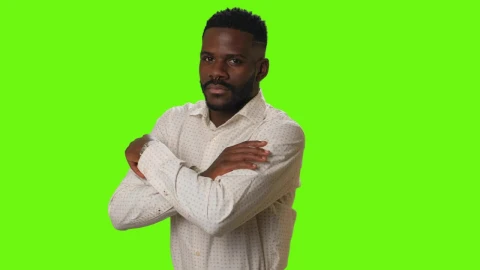 Stock Video Man Smiling With Arms Crossed On A Green Backgroun Animated Wallpaper - Free Live Wallpaper