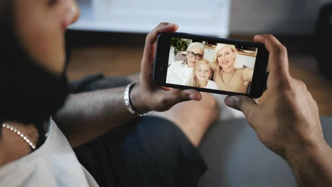 Stock Video Man Smiles At Facebook Video Call From Famil Animated Wallpaper - Free Live Wallpaper