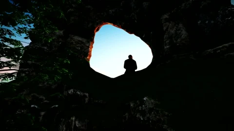 Stock Video Man Sitting On A Rocky Formations In Natur Animated Wallpaper - Free Live Wallpaper