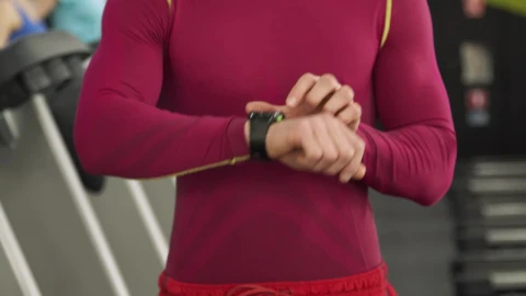 Stock Video Man Sets Timer On Smartwatch Before Gym Workou Animated Wallpaper - Free Live Wallpaper