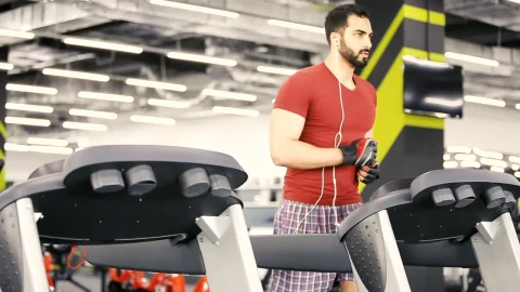 Stock Video Man Runs On Weight Loss Machine In Gy Animated Wallpaper - Free Live Wallpaper
