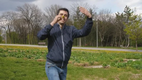 Stock Video Man Runs Happy With A Flower In The Par Animated Wallpaper - Free Live Wallpaper