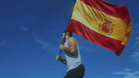 Stock Video Man Running With Spanish Fla Animated Wallpaper - Free Live Wallpaper