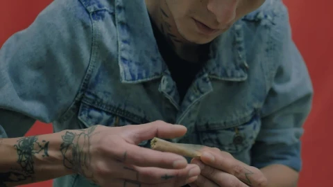 Stock Video Man Rolling Up A Cannabis Join Animated Wallpaper - Free Live Wallpaper