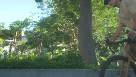 Stock Video Man Riding A Bicycle In A Par Animated Wallpaper - Free Live Wallpaper