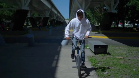Stock Video Man Rides Bicycle Under Suspended Bridg Animated Wallpaper - Free Live Wallpaper