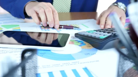 Stock Video Man Reviewing And Rectifying Graph Animated Wallpaper - Free Live Wallpaper