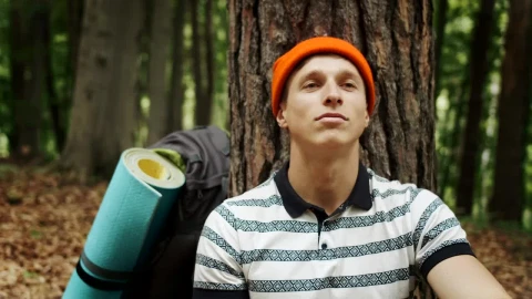Stock Video Man Resting In A Forest With Hopeful Attitud Animated Wallpaper - Free Live Wallpaper