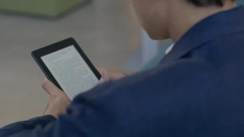 Stock Video Man Reading An Electronic Boo Animated Wallpaper - Free Live Wallpaper