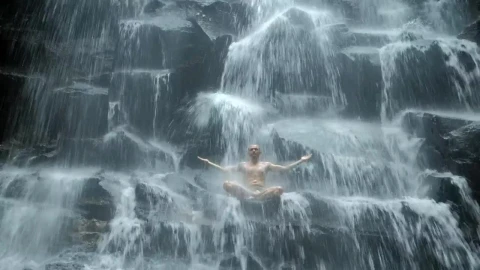 Stock Video Man Practicing Mind Body Meditation In Waterfal Animated Wallpaper - Free Live Wallpaper