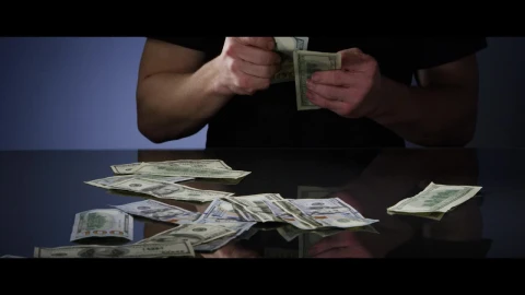 Stock Video Man Picking Up Bills From The Tabl Animated Wallpaper - Free Live Wallpaper