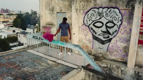Stock Video Man On Rooftop With Smoke Bom Animated Wallpaper - Free Live Wallpaper