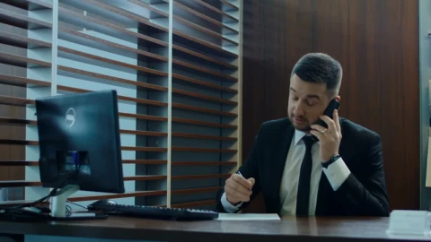 Stock Video Man On A Phone Call At His Des Animated Wallpaper - Free Live Wallpaper