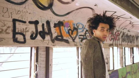 Stock Video Man Modeling In Graffitied Tunne Animated Wallpaper - Free Live Wallpaper